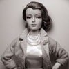 Photo of Ivy Jordan vinyl doll wearing Pink and Pearls