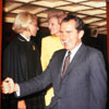 DL Ambassador Sally Sherbin, Pat Nixon, and President Richard Nixon aboard the Disneyland Railroad, August 16, 1968