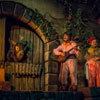 Disneyland Pirates of the Caribbean minstrels and burning city June 2013