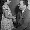 Shirley Temple and J. Edgar Hoover in her Fox bungalow, September 1937