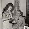 Shirley Temple at home with John Agar for breakfast, 1946