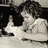 Shirley Temple at Rockingham home making biscuits